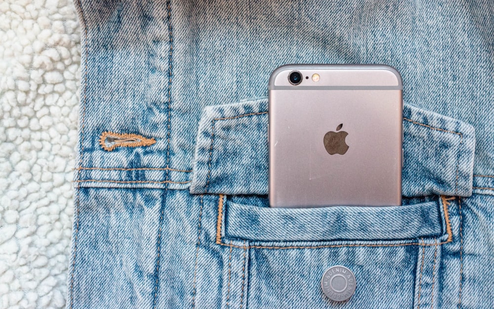 silver iphone 6 on blue denim textile