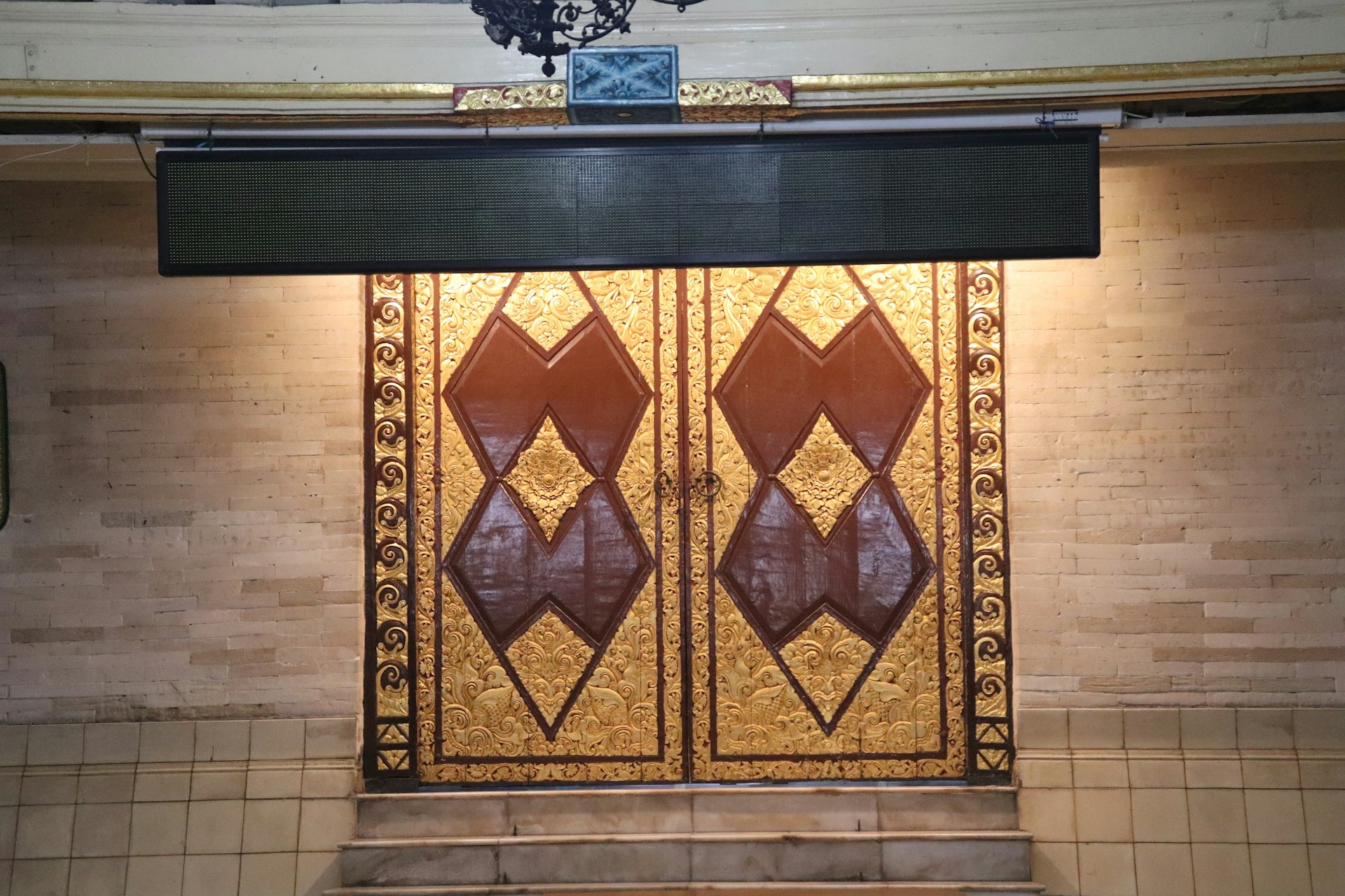 woman wearing yellow long-sleeved dress under white clouds and blue sky during daytime