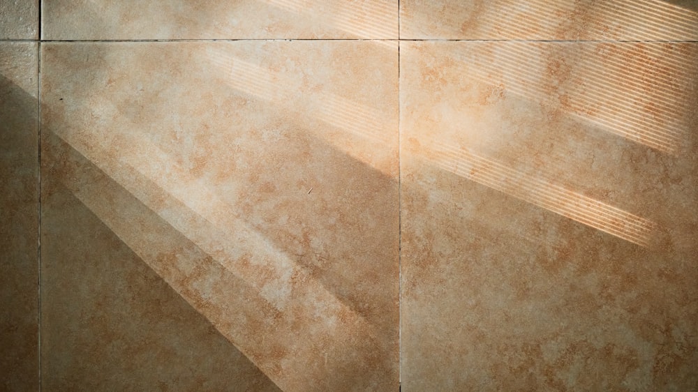 brown and white ceramic floor tiles