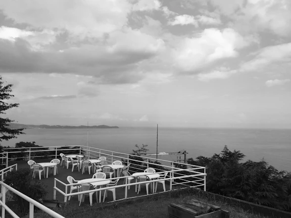 A peaceful outdoor patio overlooking the ocean, perfect for relaxation.