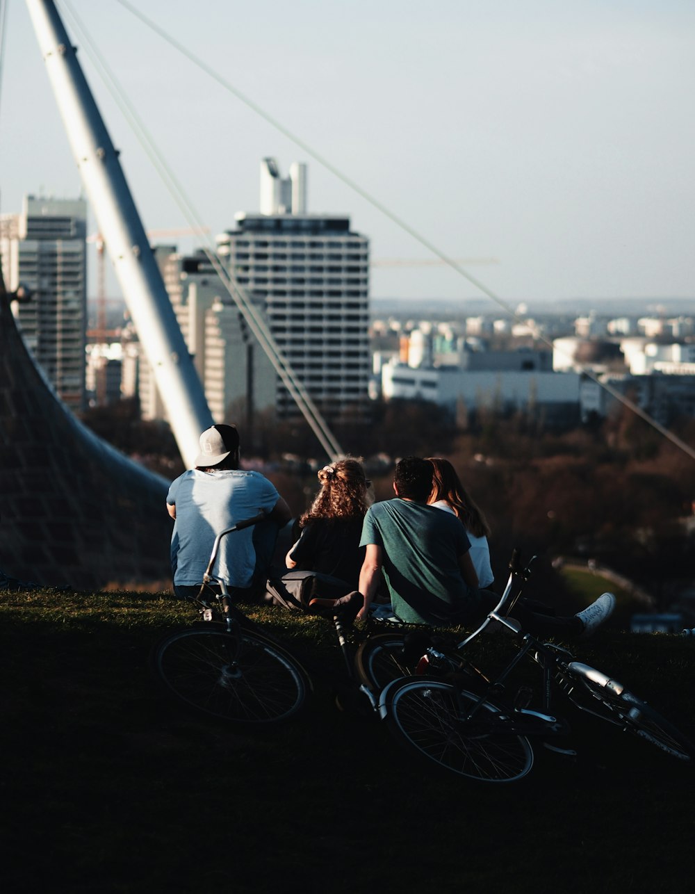 people sitting on mountain bike during daytime