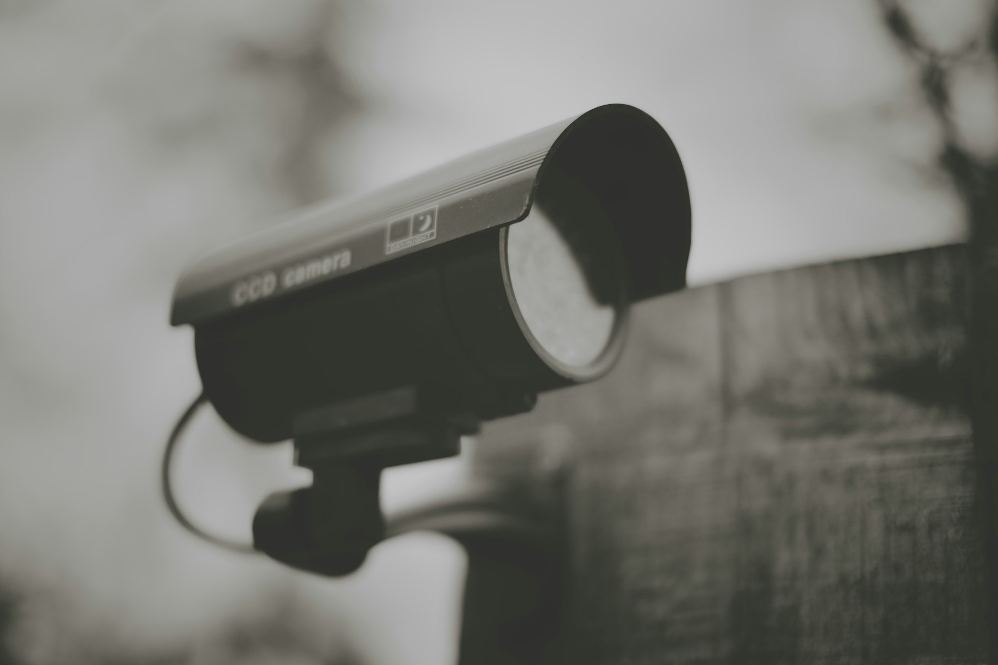 A black and white picture of a CCTV camera