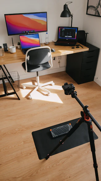 black computer keyboard on brown wooden desk