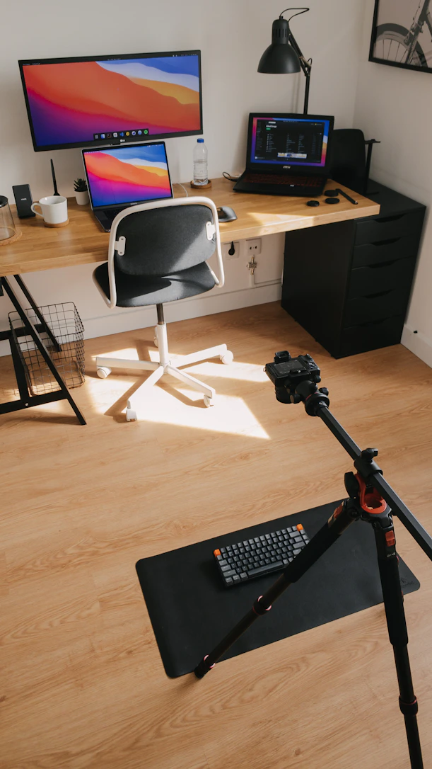 black computer keyboard on brown wooden desk