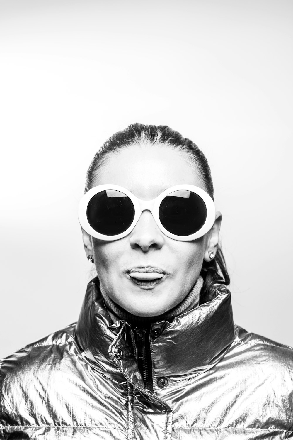grayscale photo of woman wearing sunglasses