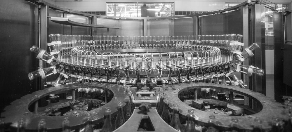 grayscale photo of stadium with chairs