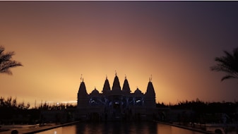 silhouette of building during sunset