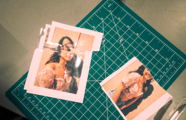 Before and after side-by-side comparison of an old torn photo beautifully repaired.