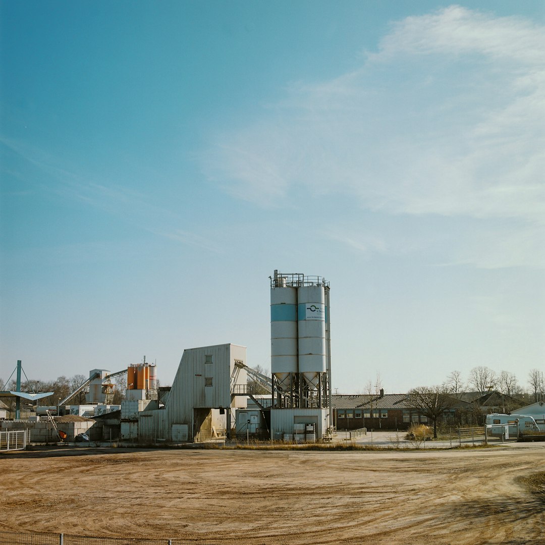 white concrete building under blue sky during daytime