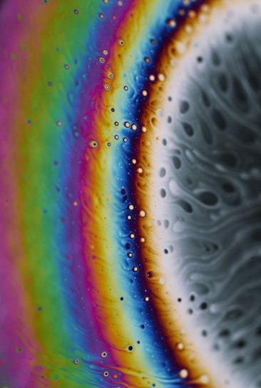 A vibrant close-up of colorful slime textures blending together in a playful swirl.