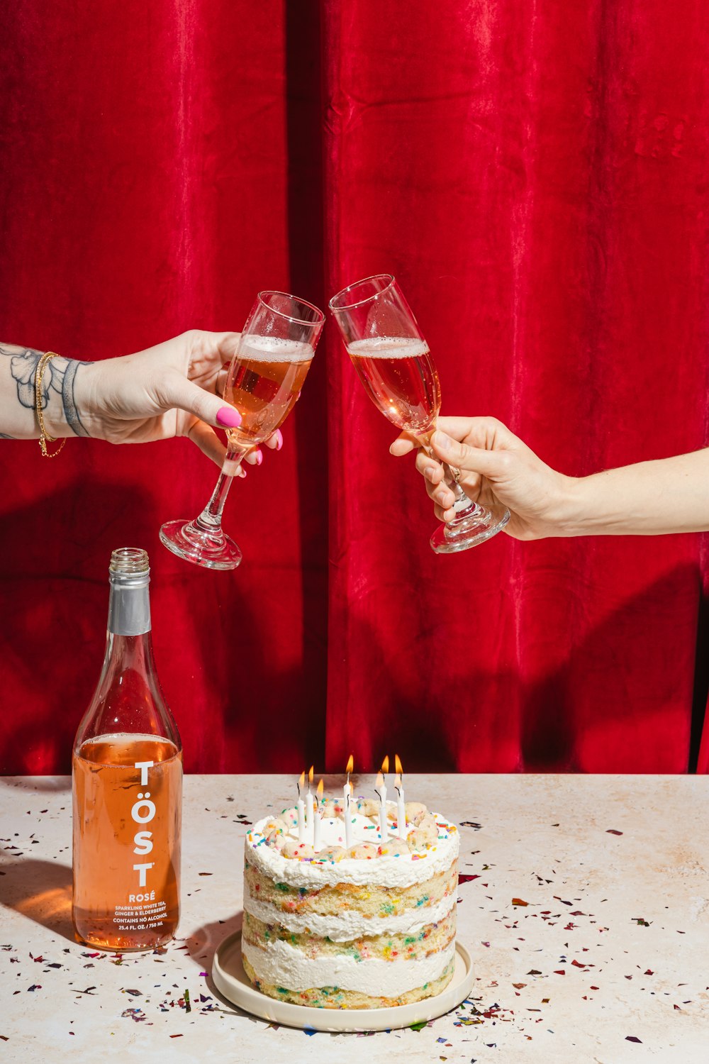 person holding clear wine glass