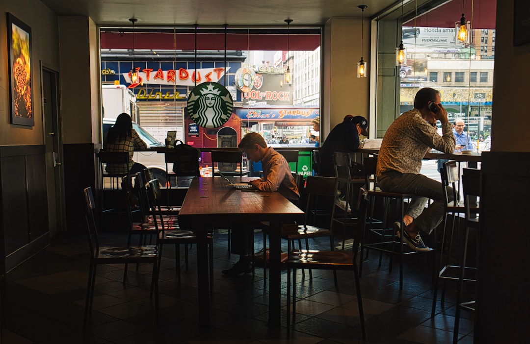 people sitting on chair in restaurant