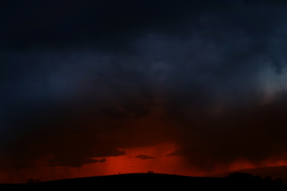 silhouette of mountain during sunset