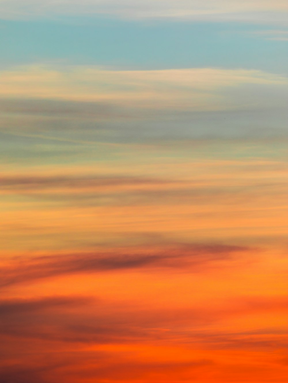 orange and blue cloudy sky