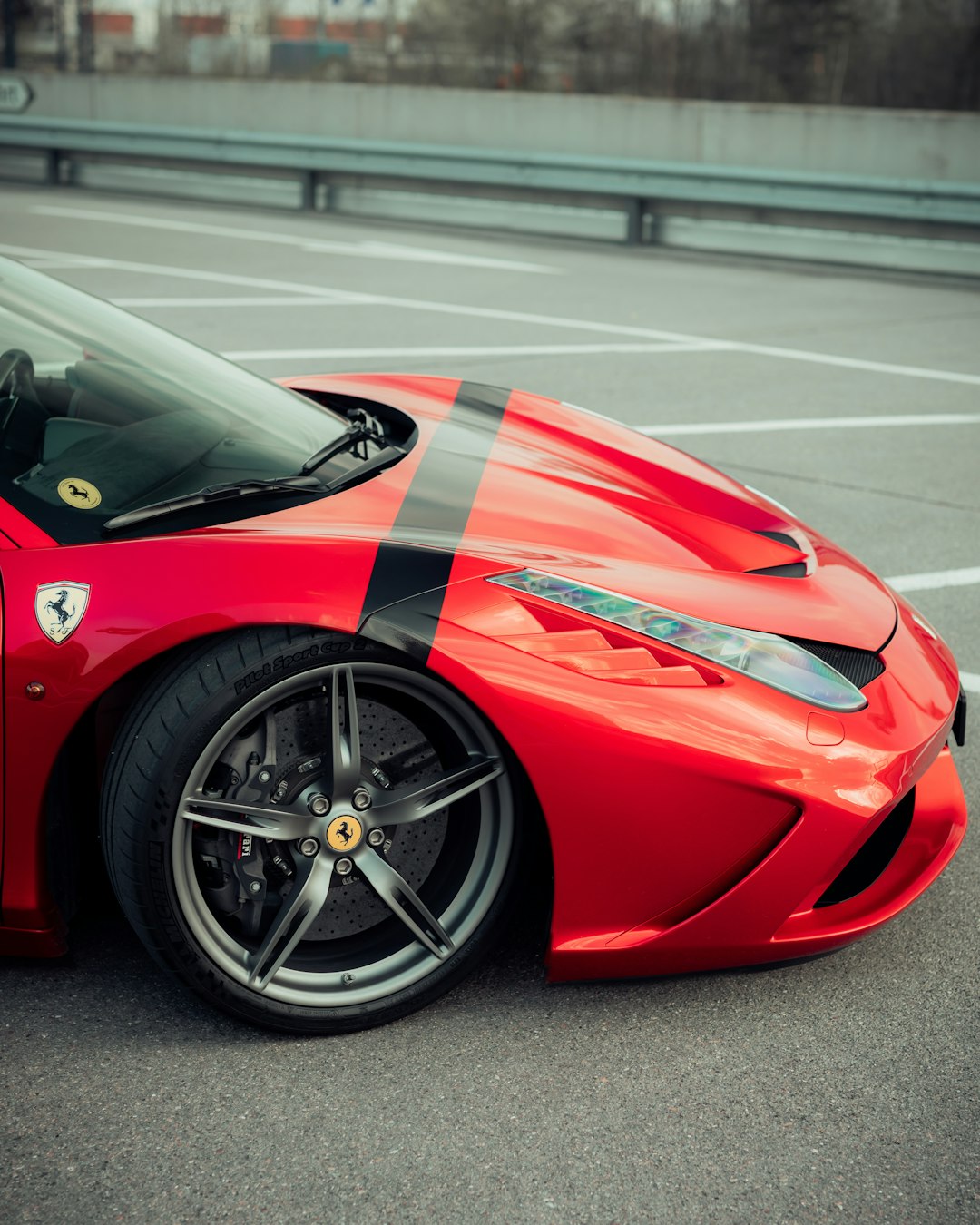 red ferrari 458 italia on road