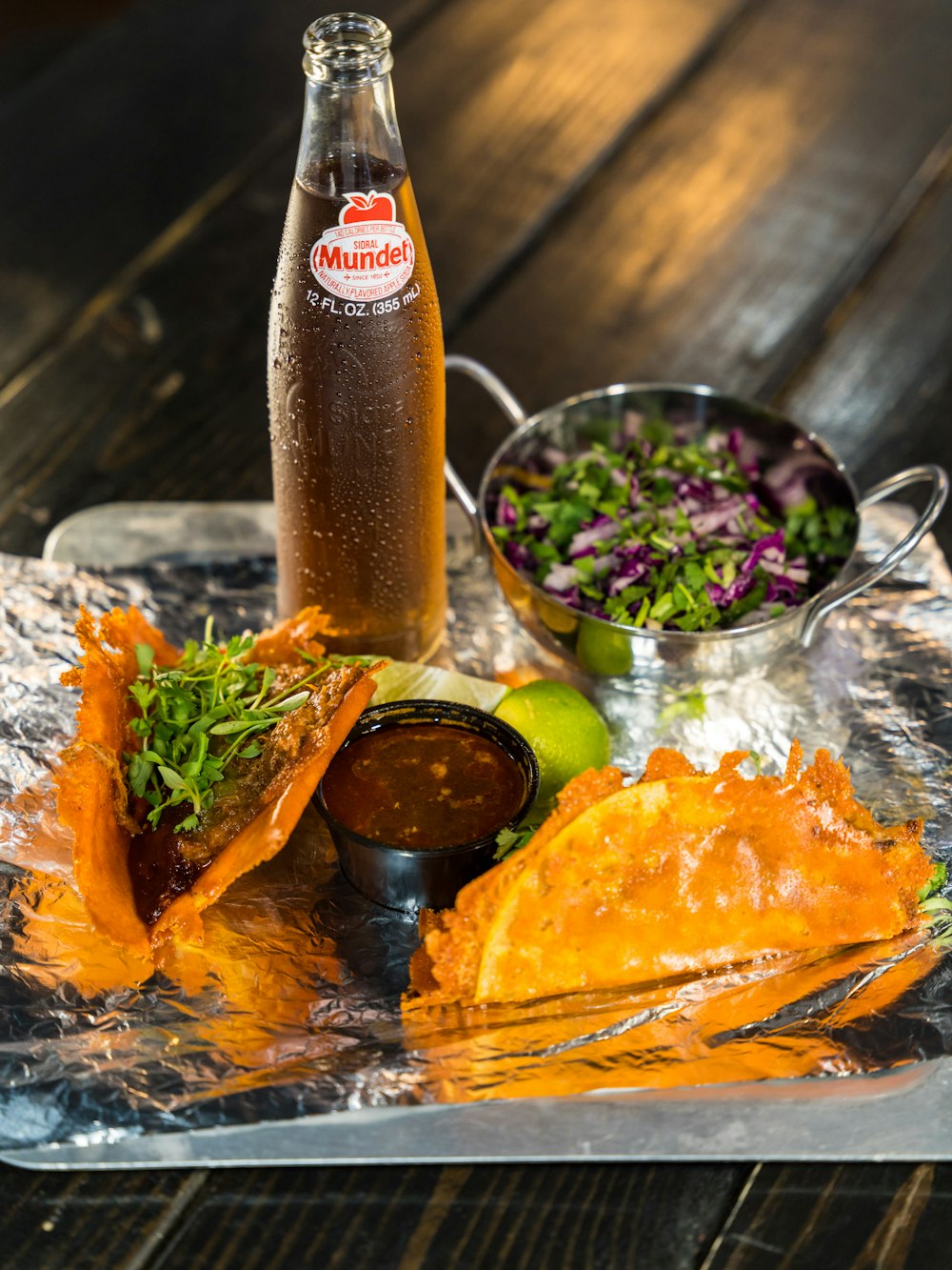 clear drinking glass with orange liquid