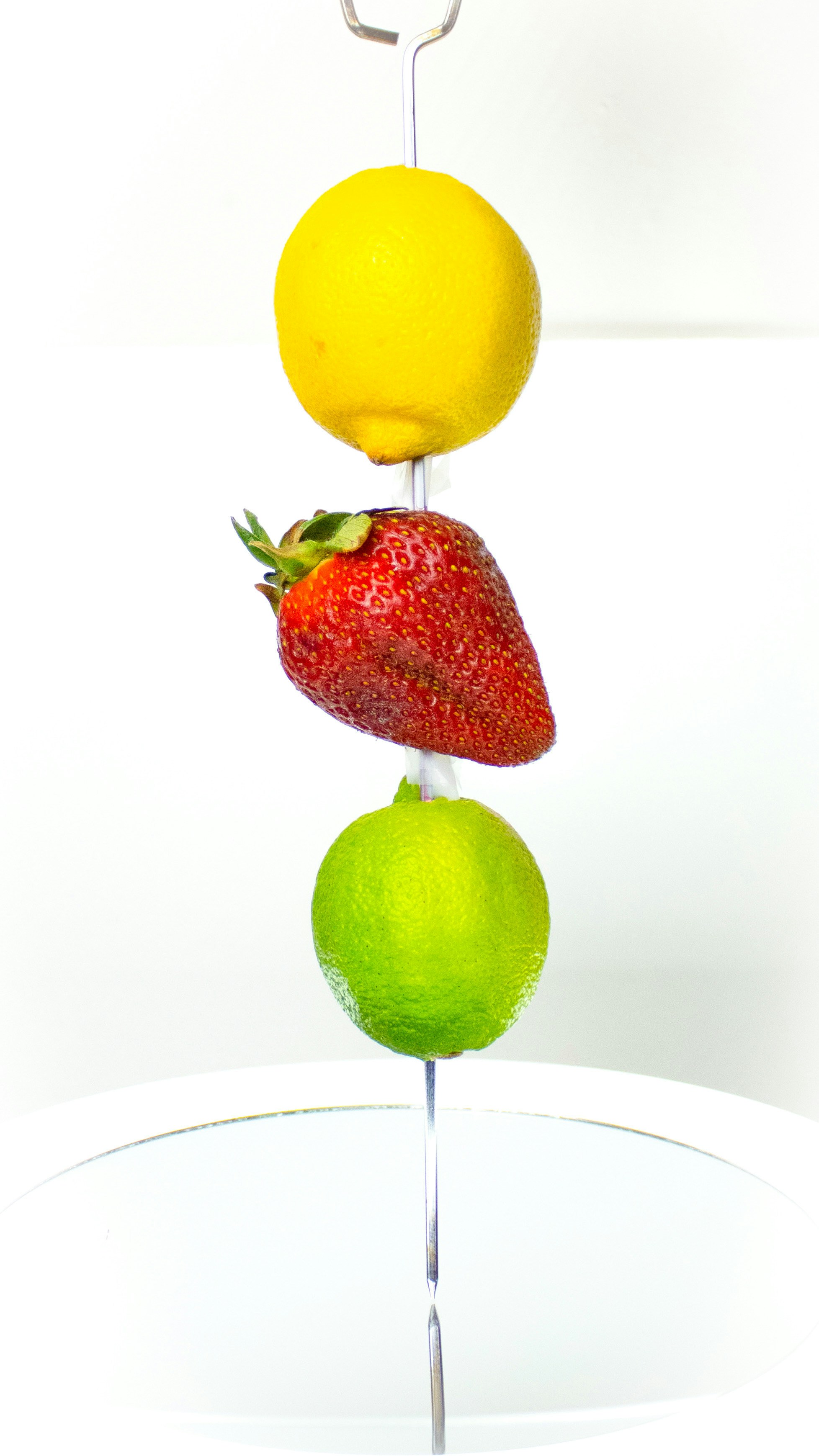 red strawberry and yellow lemon fruit