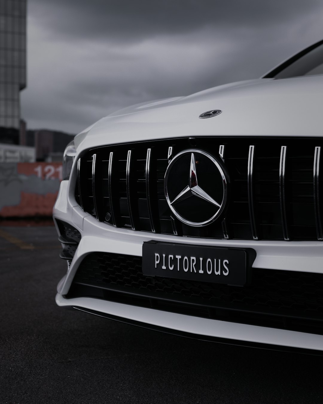 white mercedes benz car on road during daytime