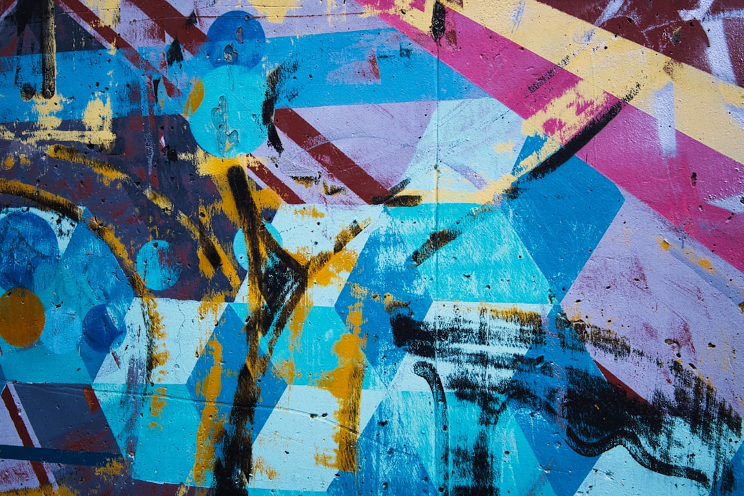 blue red and yellow abstract painting, A detail of a wall painting