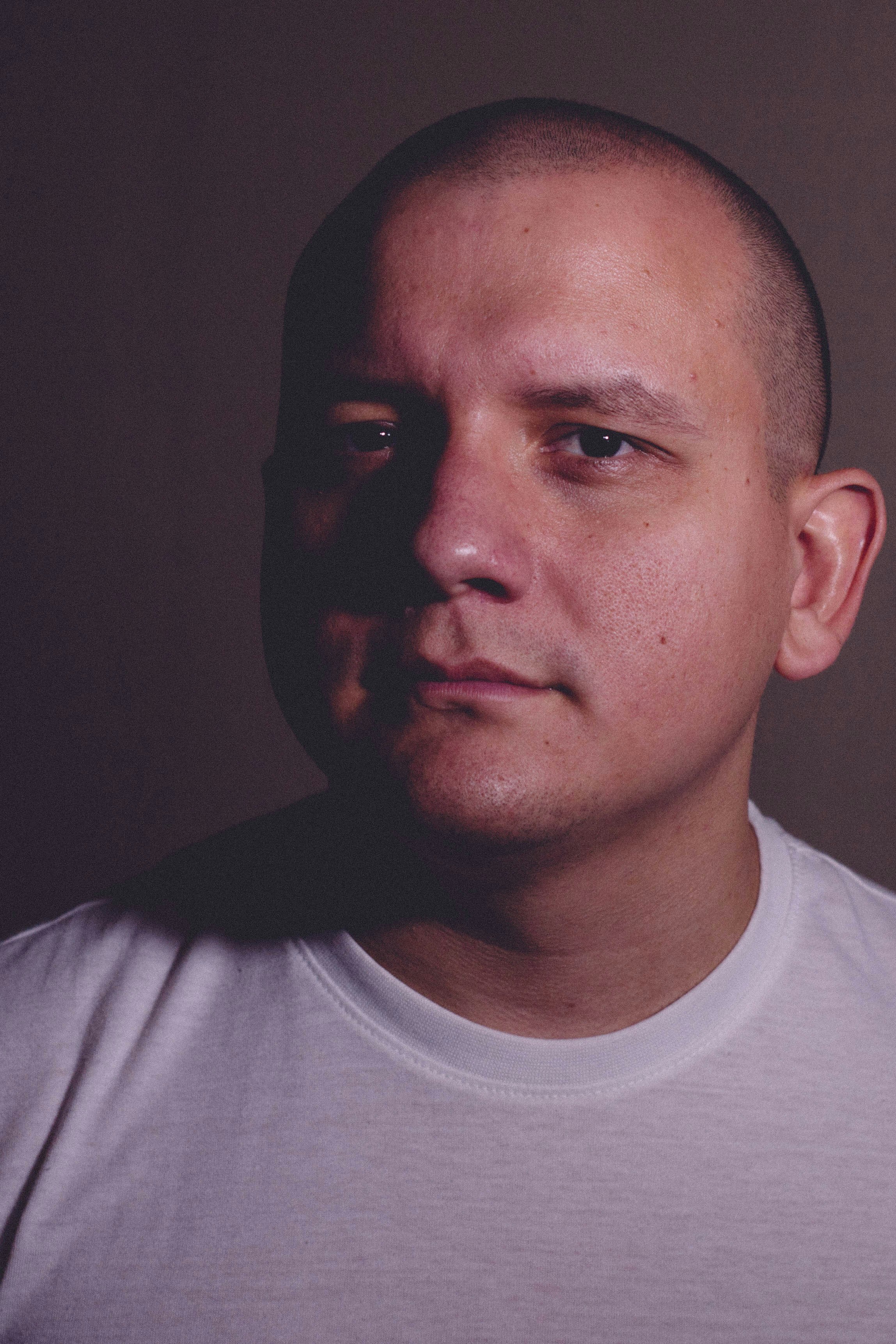 man in white crew neck shirt