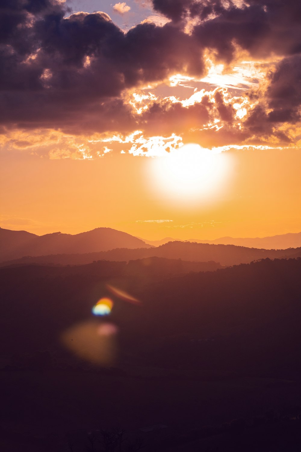 sun setting over the mountains