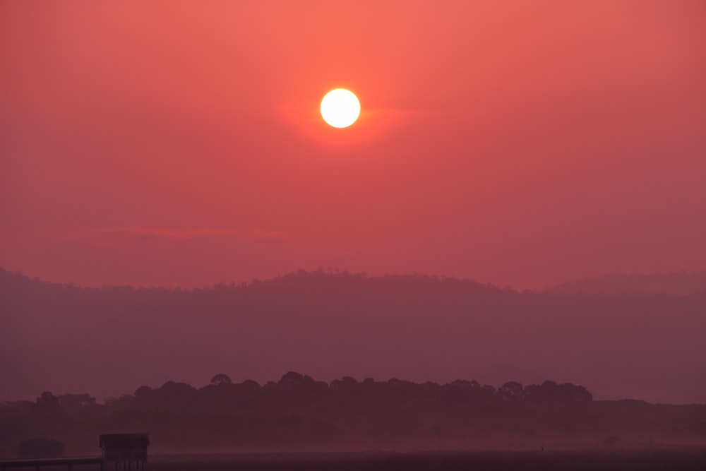 silhouette of mountain during sunset