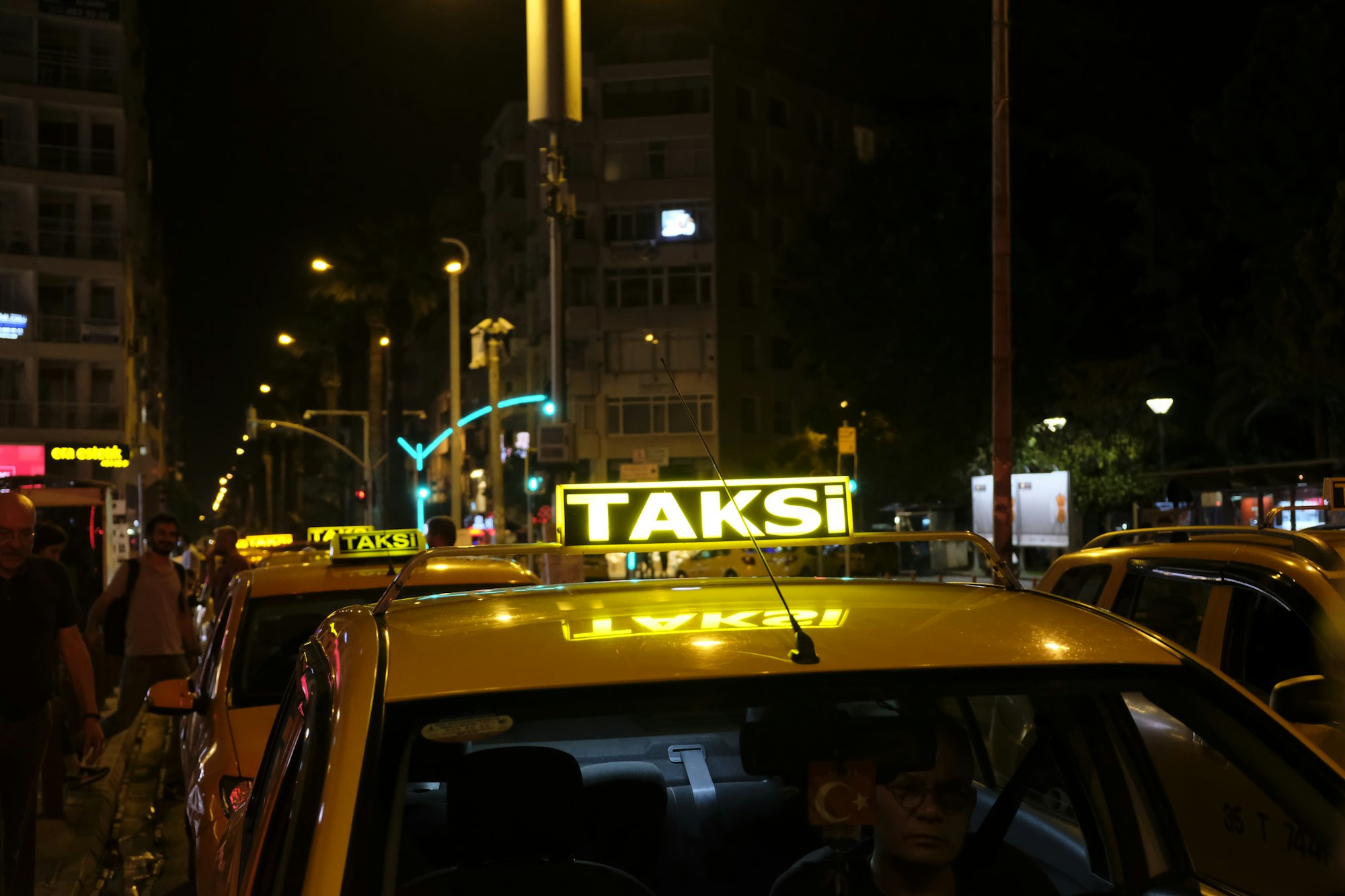 Antalya at night. Taxis in the foreground.