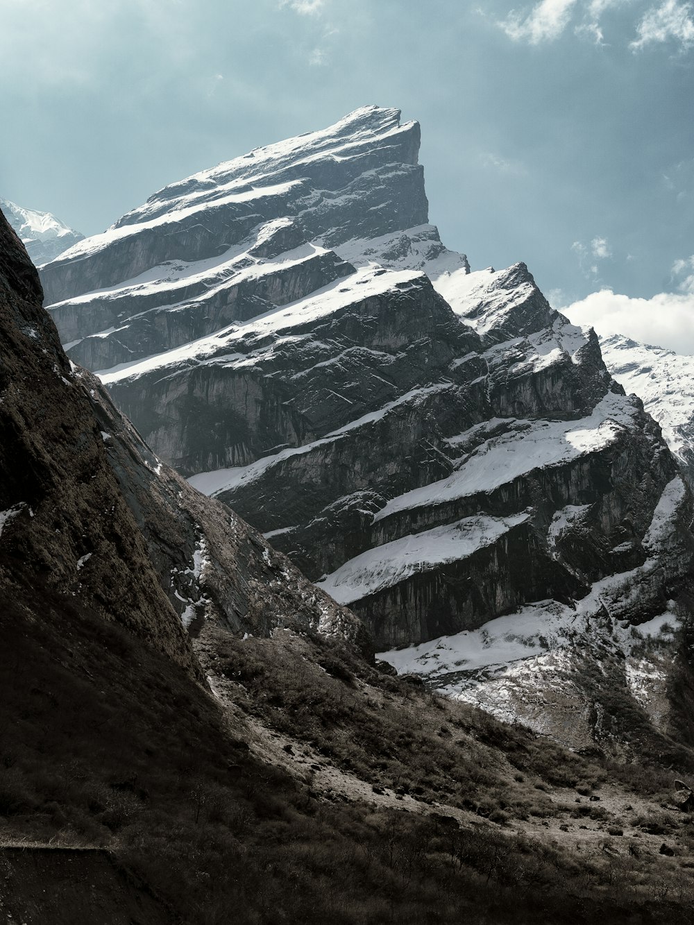 snow covered mountains under blue sky during daytime