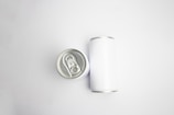 silver can on white table