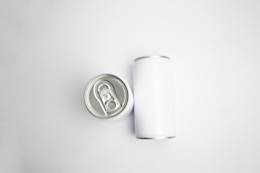 silver can on white table