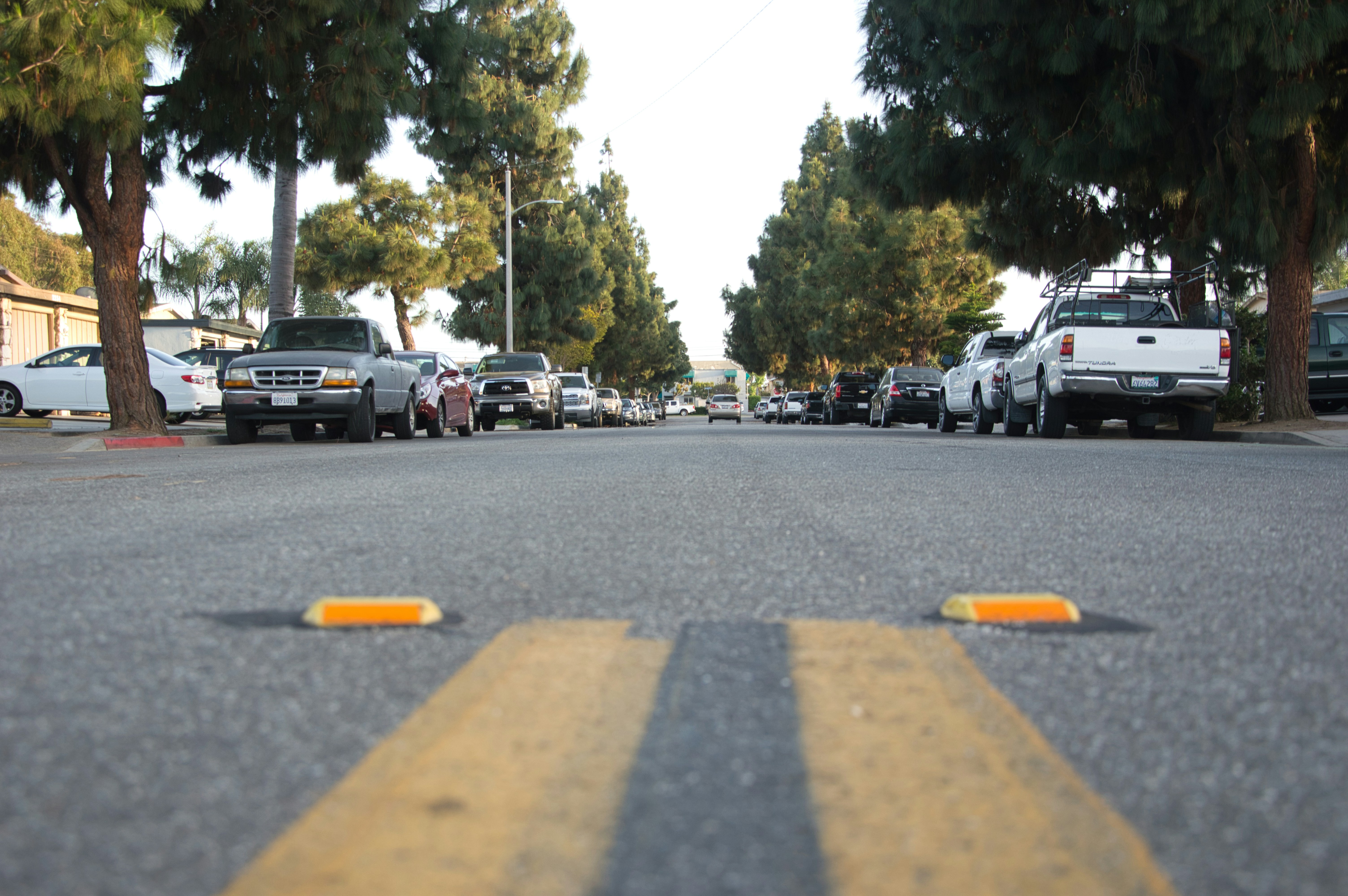 cars parked on parking lot during daytime