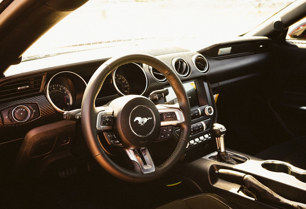 black and silver car steering wheel