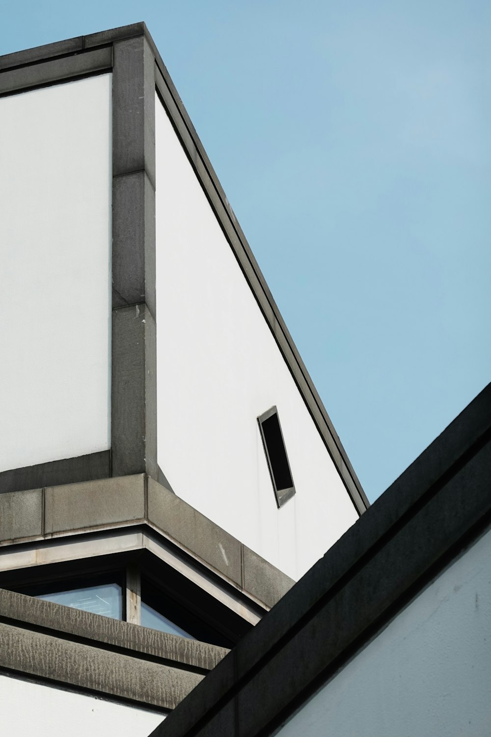 white concrete building under blue sky during daytime