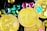 Several shiny gold coins featuring the Bitcoin symbol surrounded by brightly colored gemstones.