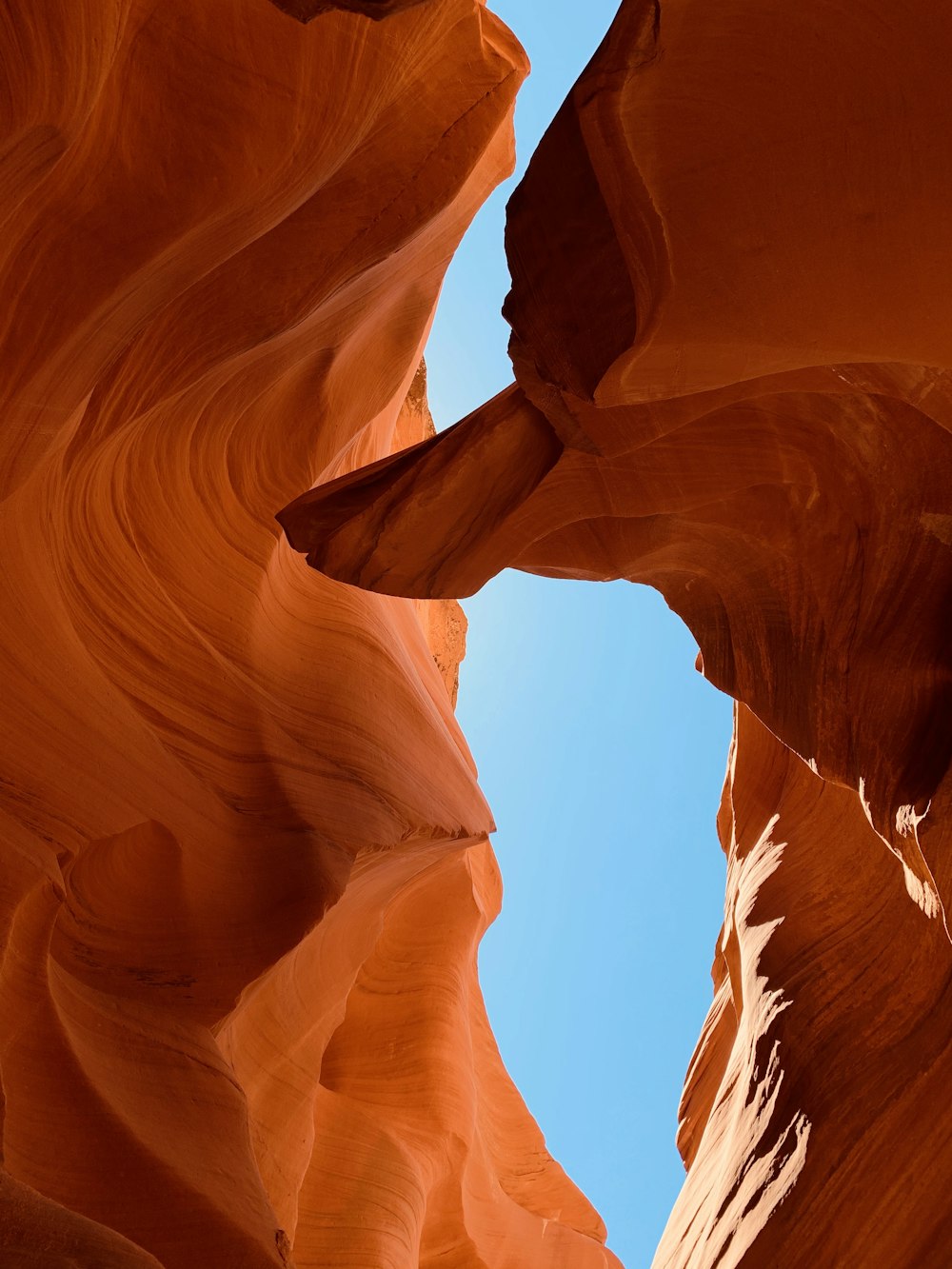 brown rock formation under blue sky during daytime