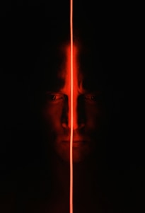 man with light in the dark