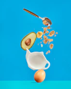 white ceramic mug with silver spoon