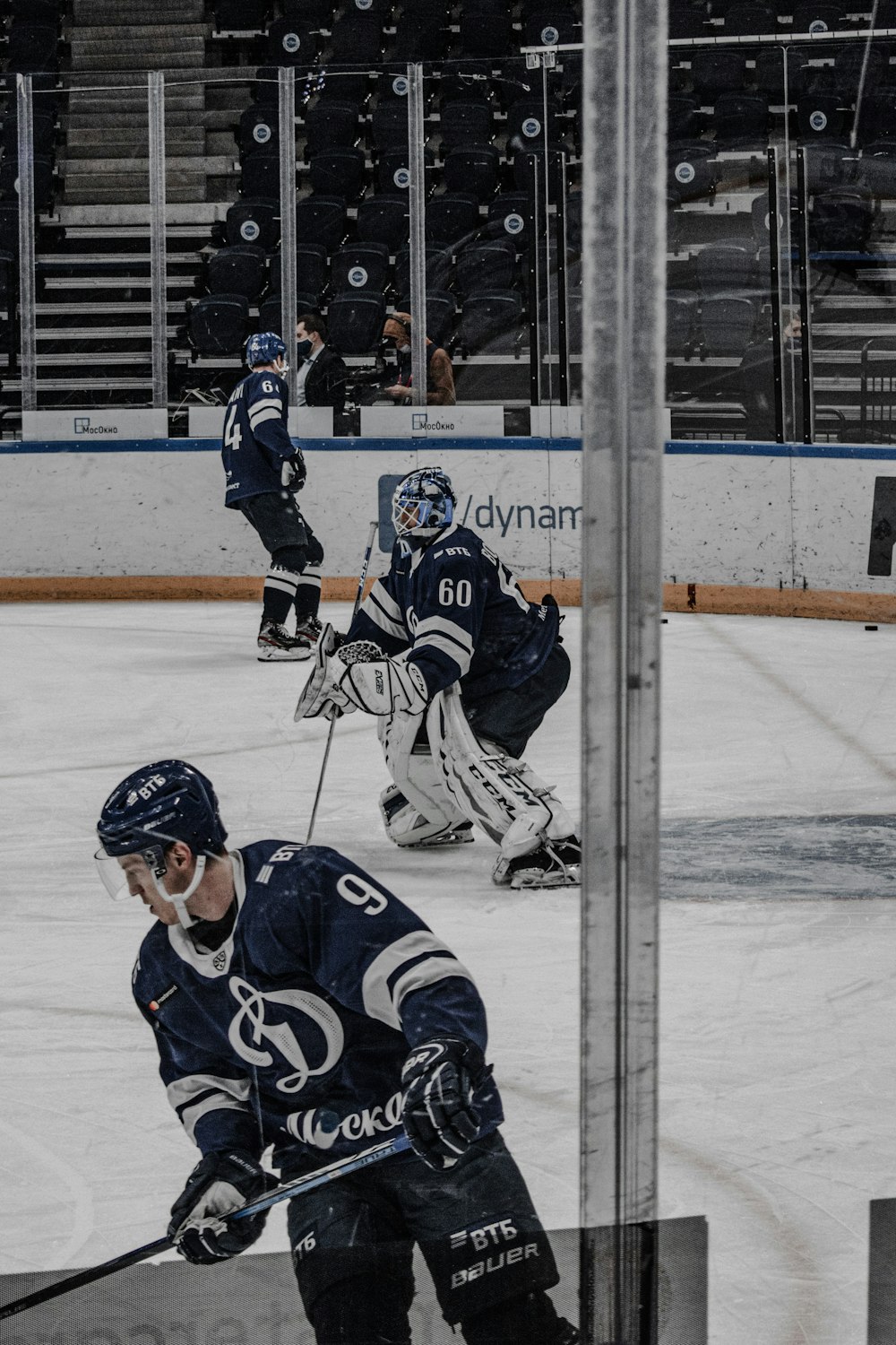 ice hockey players on ice hockey field