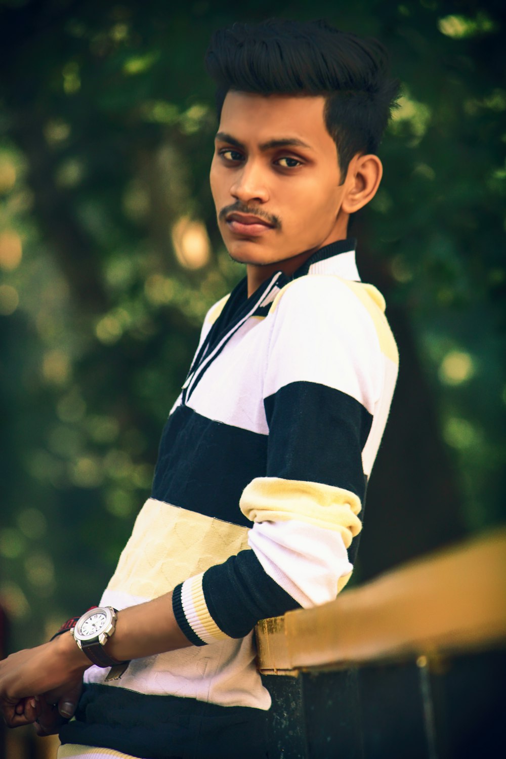 boy in black and white long sleeve shirt