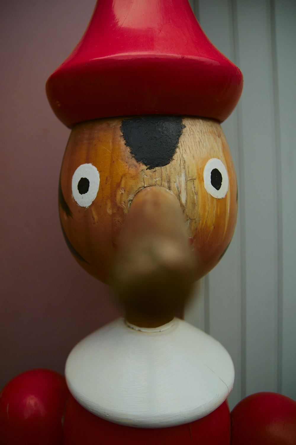 brown and red duck figurine