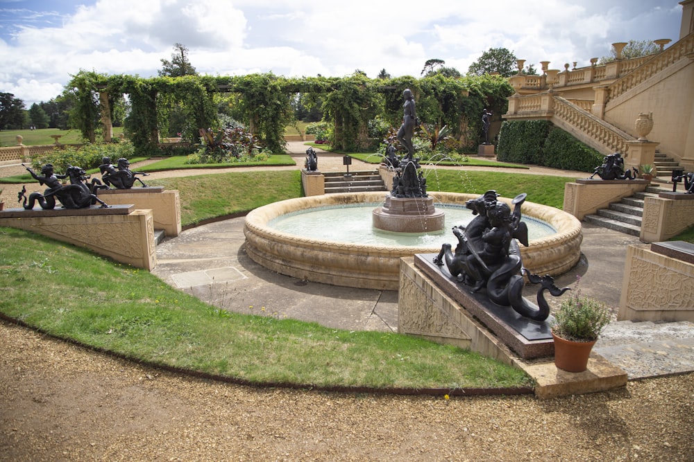 black concrete outdoor fountain during daytime