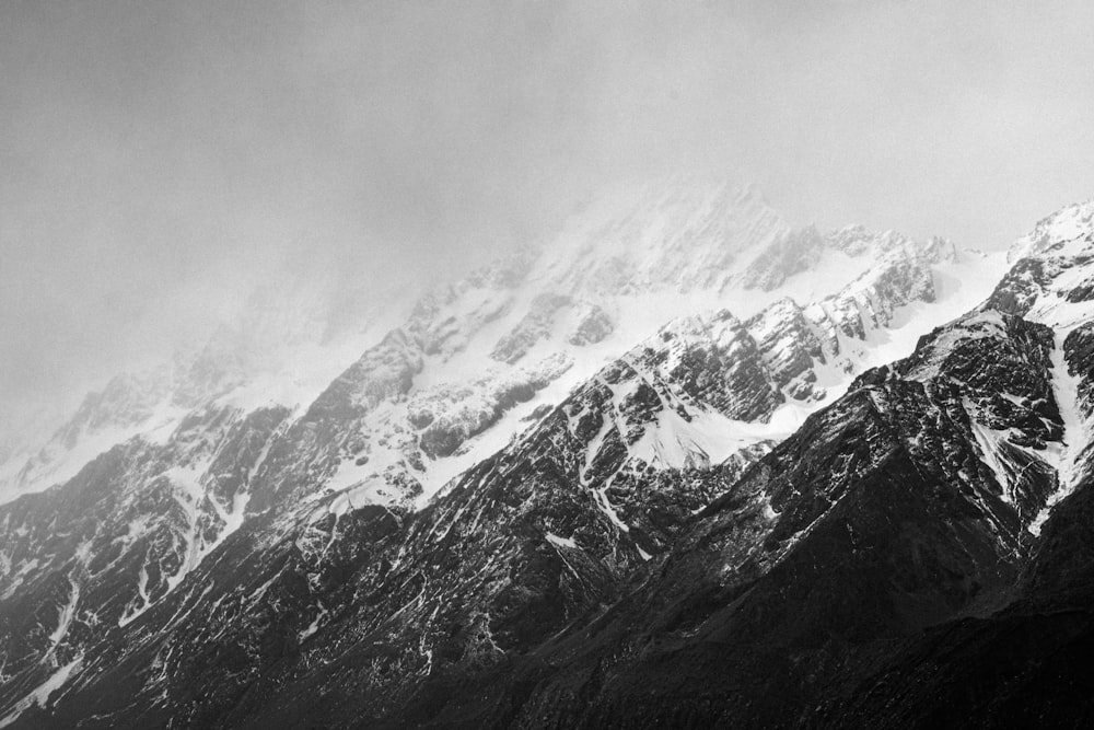 grayscale photo of snow covered mountain