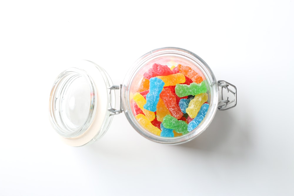 clear glass jar with red and yellow food