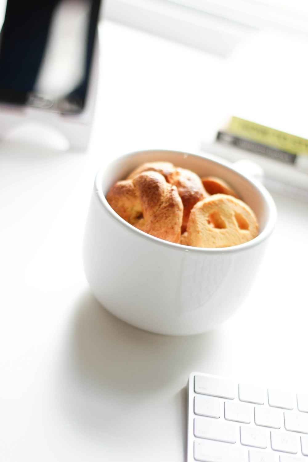 white ceramic bowl with brown bread