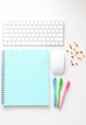 white apple keyboard beside white apple magic mouse