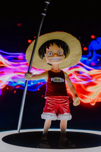 A vibrant prize item featuring a popular character in a playful pose.