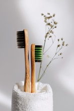 brown wooden sticks on white textile