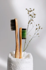 brown wooden sticks on white textile