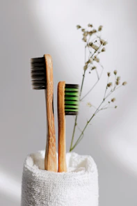 brown wooden sticks on white textile