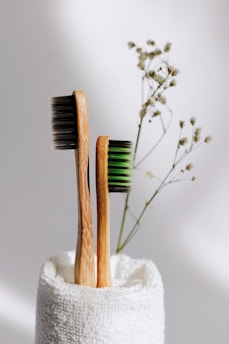 brown wooden sticks on white textile